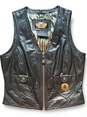 Vintage Harley Davidson black leather vest with snake print lining